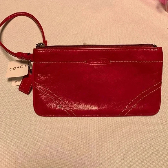 COACH Wristlet, patent leather. NWT.